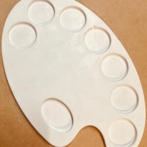 figura de yeso paleta de pintura